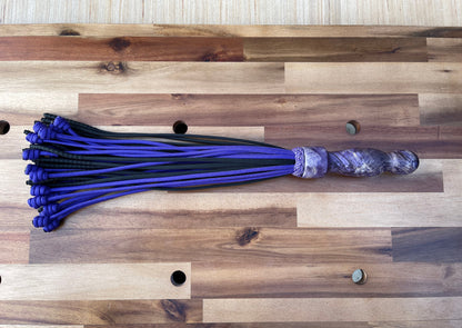 Weighted purple and black paracord flogger for BDSM and impact play