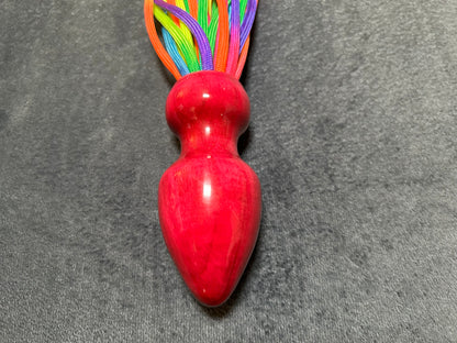 Rainbow weighted paracord flogger with pink buttplug handle