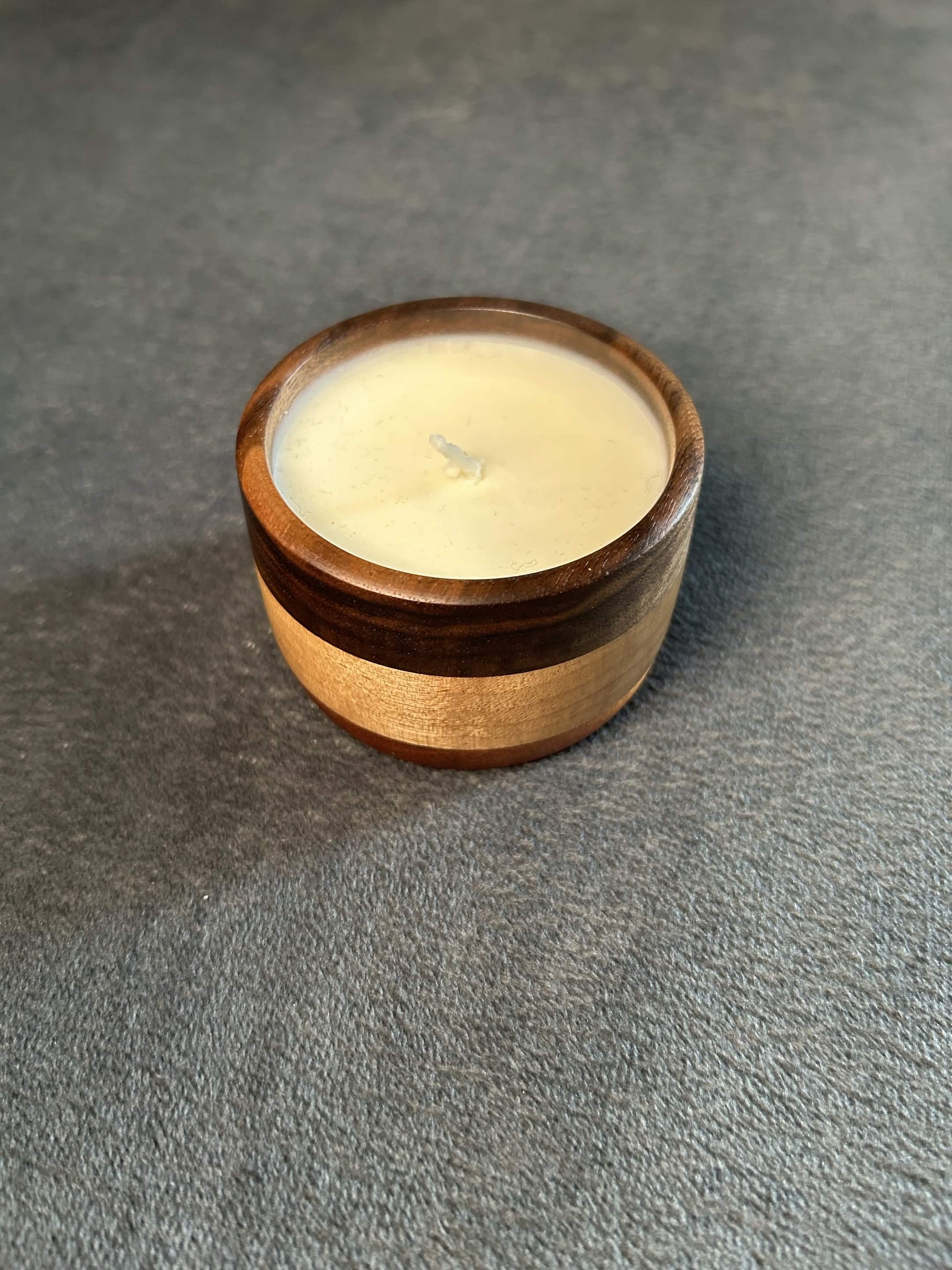 Wax play and massage candle in hardwood bowl